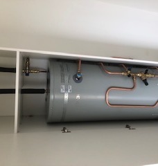 In cupboard hot water cylinder ( installed)